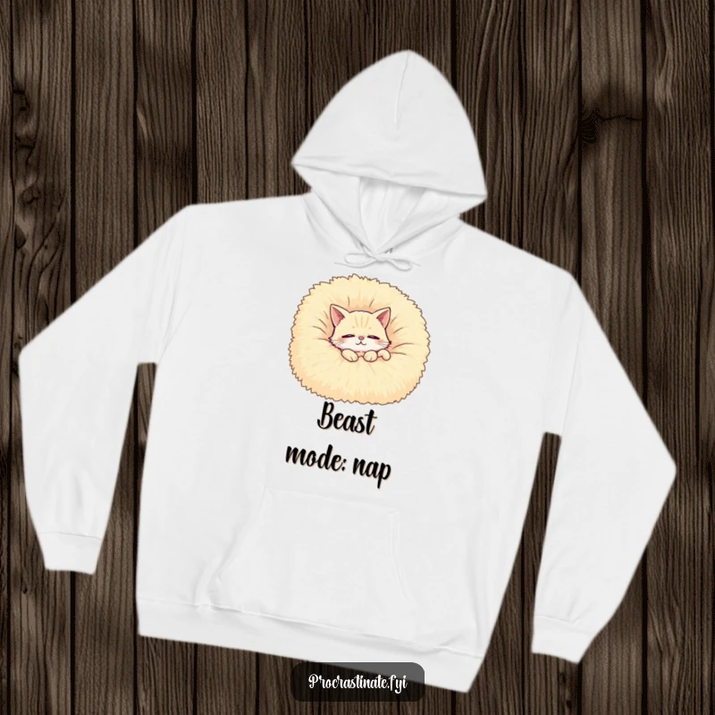 Funny hoodie featuring a contented cat lounging with half-closed eyes on a giant, fluffy blanket, perfect for staying warm.