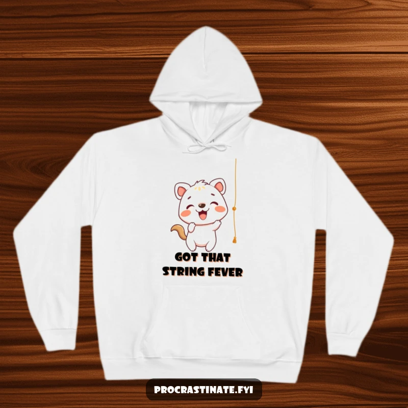 Funny Hoodie displaying a cheerful animal character playfully batting at a dangling string, designed for cozy, energetic vibes.
