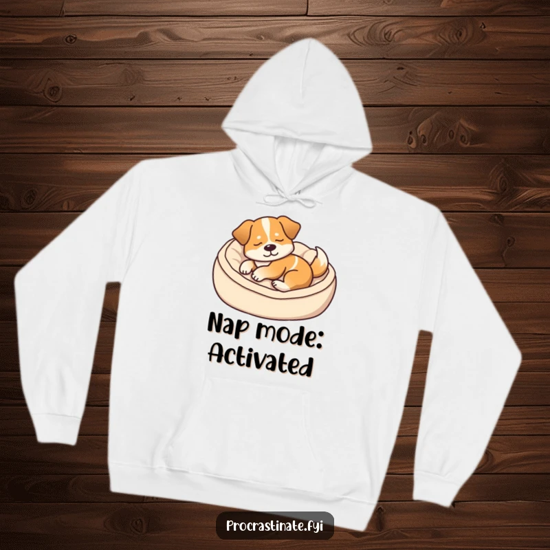 Funny hoodie featuring a content dog dozing in a plush dog bed, its tail indicating a soft, happy thump.
