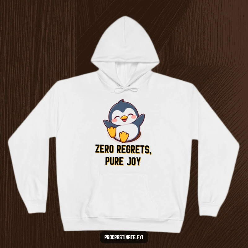 Funny hoodie showing a happy penguin character sliding downhill with eyes closed, embracing the snowy slide with pure delight.